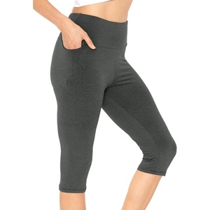 image:imageSTRETCH IS COMFORT Capri Leggings for Women Plus Size Pants with Pockets  Wide high waist knee length 95 polyester 5 spandex leggings for women tummy control Yoga leggings with pockets for womenCharcoal Gray